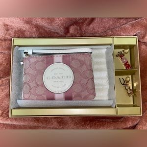 Coach Dempsey pink wristlet